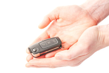 Hands giving or receiving a car key