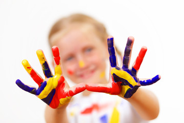 happy child with paint on the hands