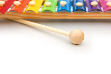 colorful xylophone on white with copy space