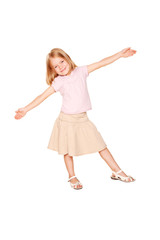 Happy little girl dancing. Isolated on white