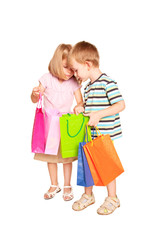 Children shopping. Young couple, little boy and little girl