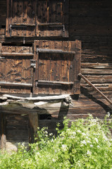 Fototapeta na wymiar Old wooden mazot huts in Zermatt in the Swiss Alps