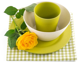 Plate and glass of colored bamboo and yellow rose