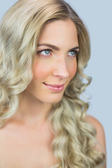 Naklejka premium Thoughtful natural blonde posing
