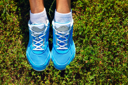 Running Shoes On Grass - Concept Image