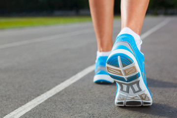 Fototapeta na wymiar Closeup of runners shoe - running concept