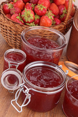 strawberry jam, wicker basket and casserole