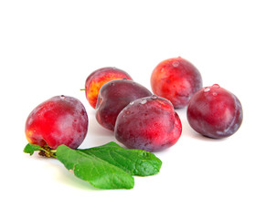 ripe plums with drops