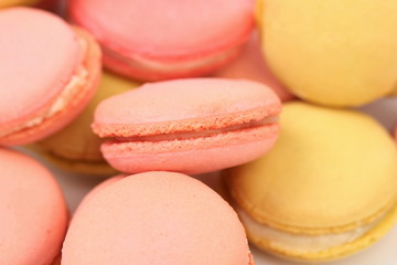 Background of several various  macaron cakes.