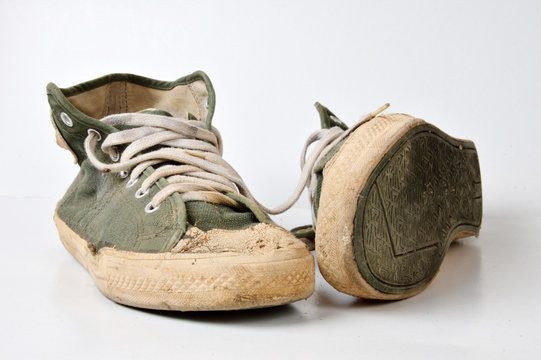 Old Used Green Sneakers