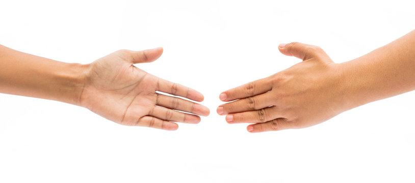 Two female hands about to shake hands