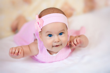 cute baby girl in a pink dress