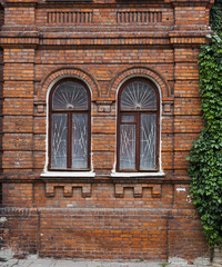 Fototapeta na wymiar wall with windows of an old building