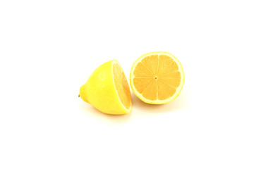 Cut the lemon in half isolated on white background