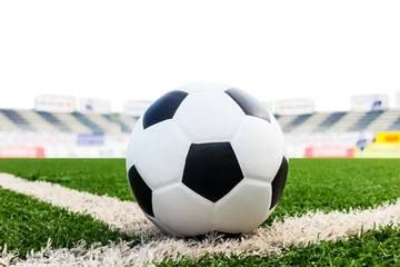soccer ball on green grass field isolated