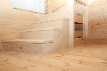 Obraz na płótnie Canvas Steps of wooden loft stairs under conctruction