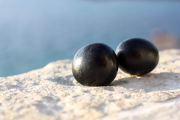 Two Black Pebbles