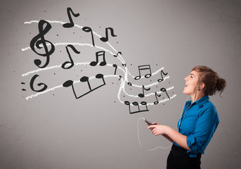 attractive young lady singing and listening to music with musica