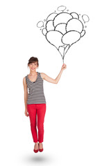Happy woman holding balloons drawing