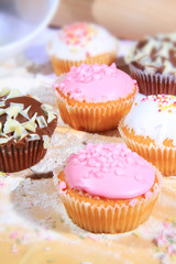 icing cakes freshly baked