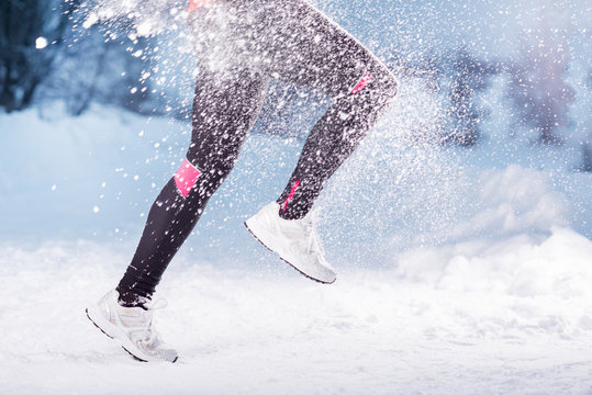 Woman Running In Winter