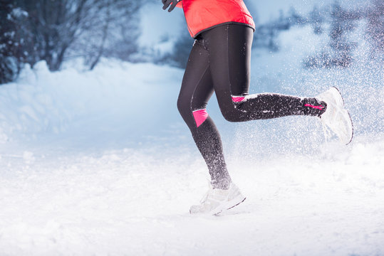 Woman Running In Winter