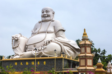Massive white Sitting Buddha statue at Vinh Trang Pagoda, Vietna