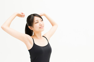 Obraz na płótnie Canvas attractive asian woman exercising on white background