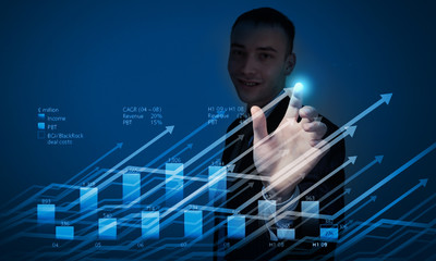 Fototapeta premium Young businessman touching icon