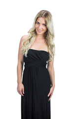 Cheerful attractive blonde with black cocktail dress posing
