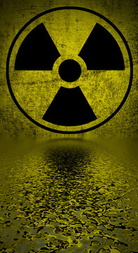 Ionizing radiation hazard symbol reflected in water surface.