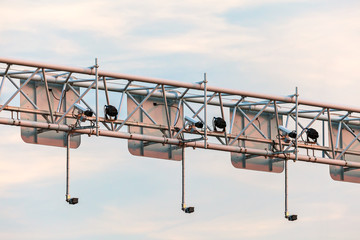 Surveillance camera system above a highway