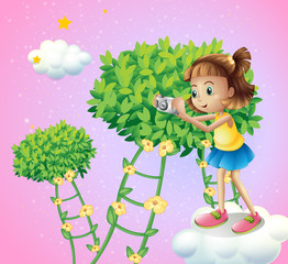 A girl taking pictures near the ladder plants