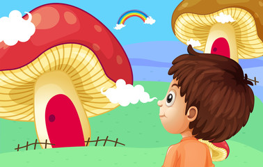 A young boy watching the giant mushroom houses