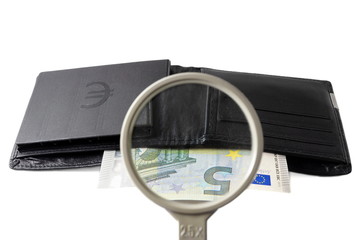 find investor concept with wallet and magnifier