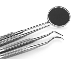 Basic dentist tools isolated on white