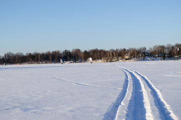 Fototapeta na wymiar people ice sail sport snow frozen lake winter day