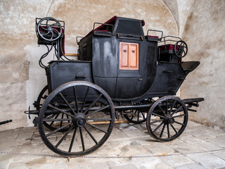 Fototapeta na wymiar Old black wagon