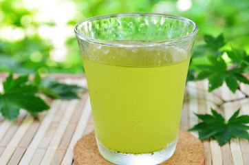 a glass of green tea