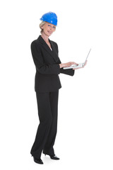 Female Architect Using Laptop