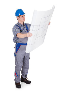 Architect Looking At Blue Print