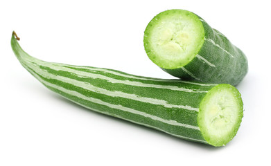 Sliced Snake gourd over white background