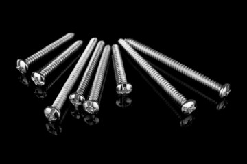 Screws on Black background
