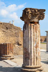 antique stone statue. at the ancient Roman city of Pompeii