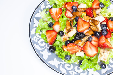 Berry salad with chicken, almond and lettuce
