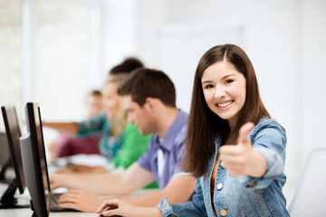 student with computers studying at school