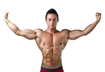 Handsome young bodybuilder  with arms spread open