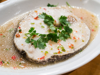 White fish steamed with lemon