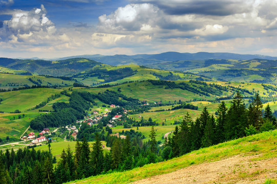 panoramic view on village in a hilly valley