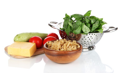 Ingredients for cooking pasta isolated on white